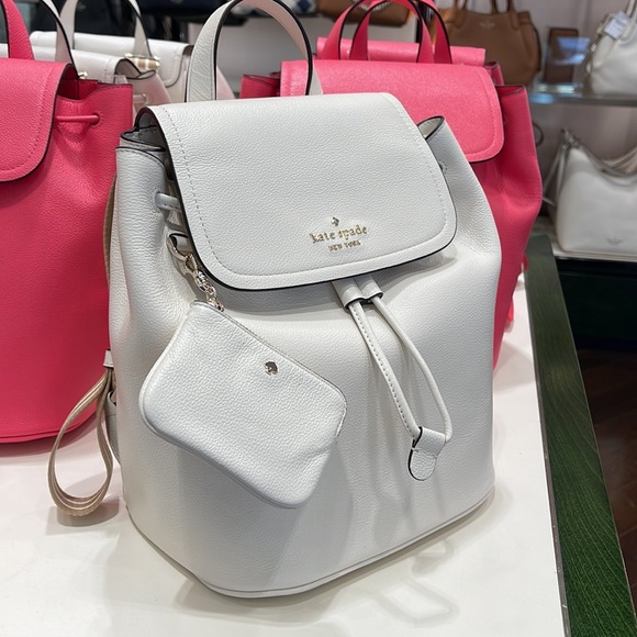Kate Spade Rosie Medium Flap Backpack 
K8714 pebbled leather Parchment rosie
NWT - Picture 2 of 16
